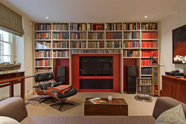 Red Color At Stylish Red Color Accent Applied At Full Wall Home Library Shelves With Black Leather Chaise And Ottoman In Cream Room Interior Design Nice Home Library With Stunning Black And White Color Schemes