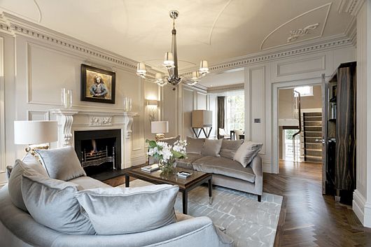 Family Room In Tempting Family Room Design Applied In Belgravia Property In London With White Curved Sofas And Big White Cushions On Glossy Wooden Floor Bedroom Classic And Elegant Modern Home With Luxurious Interior Design Themes