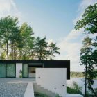 Casa Barone Shape Adorable Casa Barone In Compact Shape With Mesmerizing Lake View Sliding Glass Door Concrete Outdoor Staircase Ornamental Plants In Green Pot Dream Homes Elegant Lakeside House Surrounded With Fresh Nature Landscape