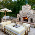Cream Outdoor Idea Amazing Cream Outdoor Sectional Sofa Idea Coupled With Coffee Table Facing Stone Patented Fireplace And Kitchen Decoration Cozy And Beautiful Outdoor Sectional Sofas For Patio Relaxation