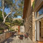 Outdoor Dining The Amazing Outdoor Dining Room Outside The Coastlands House With Long Table And Iron Chairs On Concrete Floor Dream Homes Sustainable Contemporary Home Building With Exotic Features