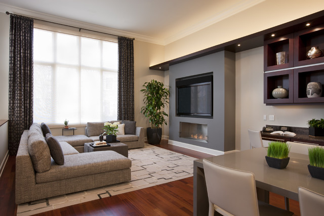 Living Room Grey Appealing Living Room Enhanced With Grey Large Sectional Sofas Ottoman And Potted Trees Placed Next To Fireplace Decoration  Swanky Large Sectional Sofas For Spacious Living Rooms