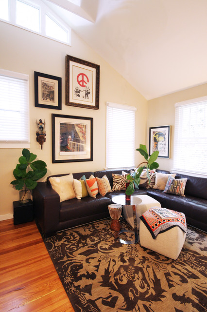 Living Room House Appealing Living Room In Attic House Enhanced With Leather Sectional Sofas Placed On Patterned Rug With Ottoman Decoration Glamorous Leather Sectional Sofas Display Classy Room Themes