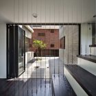 Minimalist Garden And Beautiful Minimalist Garden With Black And White Gravels In H House Tough Metallic Railing On Wood Staircase Shiny Ceiling Light Dream Homes An Old House Turned Into Sleek Contemporary Home In Montonate, Italy