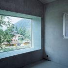 Chamoson House Large Bright Chamoson House Interior With Large Glass Window Solid Concrete Wall Precious Panorama Of Mountain And Shady Greenery Dream Homes Unusual Contemporary Rural House With Rough Stone Wall Structure