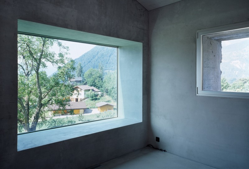 Chamoson House Large Bright Chamoson House Interior With Large Glass Window Solid Concrete Wall Precious Panorama Of Mountain And Shady Greenery Dream Homes Unusual Contemporary Rural House With Rough Stone Wall Structure