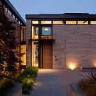 Lighting In Park Bright Lighting In The Washington Park Hilltop Residence Entrance With Wooden Door And The Stone Wall Dream Homes Amazing Modern Home With Beautiful H-Shape Exterior Layout