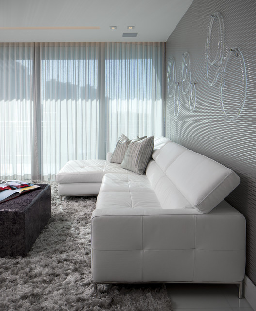 Light Grey Sofas Chic Light Grey Leather Sectional Sofas Coupled With Dark Brown Patterned Coffee Table On Fur Rug As Complement Decoration Glamorous Leather Sectional Sofas Display Classy Room Themes