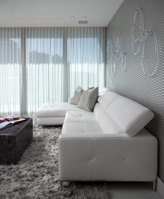 Light Grey Sofas Chic Light Grey Leather Sectional Sofas Coupled With Dark Brown Patterned Coffee Table On Fur Rug As Complement Decoration  Glamorous Leather Sectional Sofas Display Classy Room Themes