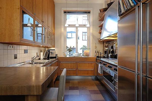 Wooden Built On Classic Wooden Built In Storage On White Tiled Floor Kitchen Of Traditional Swedish Apartment Involved Silver Stove And Oven Apartments  Vintage Swedish Home Decorated With Contemporary Scandinavian Touch Of Traditional Style