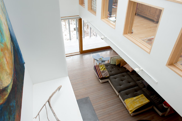 White Themed Seen Clean White Themed Living Room Seen From Upper Level Floor Displaying Grey Tufted Large Sectional Sofas Set Decoration  Swanky Large Sectional Sofas For Spacious Living Rooms