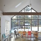 Chairs In Farmhouse Colorful Chairs In The Floating Farmhouse Dining Room With Long Wooden Table And Long Wooden Bench Apartments Bewitching Modern Farmhouse With White Color And Rustic Appearance