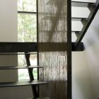 Kettle Hole Staircase Contemporary Kettle Hole Home Indoor Staircase Idea Designed With Black Painted Steps And Sheer Shade As Divider Dream Homes Cantilevered Contemporary Home With Captivating Living Room Spaces