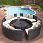 Dark Rattan Sofa Cool Dark Rattan Outdoor Sectional Sofa Designed In Curved Concept With White Cushions And Pillows And Table Decoration Cozy And Beautiful Outdoor Sectional Sofas For Patio Relaxation