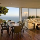 Dining Room Table Cozy Dining Room With Long Table And Brown Chairs On Hardwood Floor Inside The Coastlands House Dream Homes Sustainable Contemporary Home Building With Exotic Features