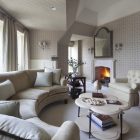 Neutral Themed Idea Cozy Neutral Themed Living Room Idea Warmed Up By Fireplace Completed With Curved Sectional Sofa And Table Decoration Comfortable Curved Sectional Sofas For Small Living Rooms