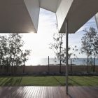 Porch With Floors Cozy Porch With Laminate Wood Floors Facing Green Grass And Tall Trees In Front Yard Of Flo House Building Dream Homes Contemporary Australian Home With Unique Cantilever Roofing And Buildings