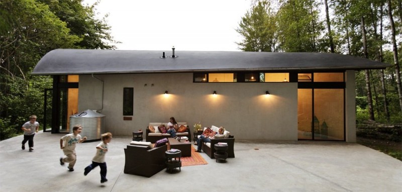 Terrace Oustide Studio Cozy Terrace Outside The Nautilus Studio With Rattan Furniture And Brown Carpet On The Concrete Floor Decoration  Small And Beautiful Home Studio Designed For A Textile Artist