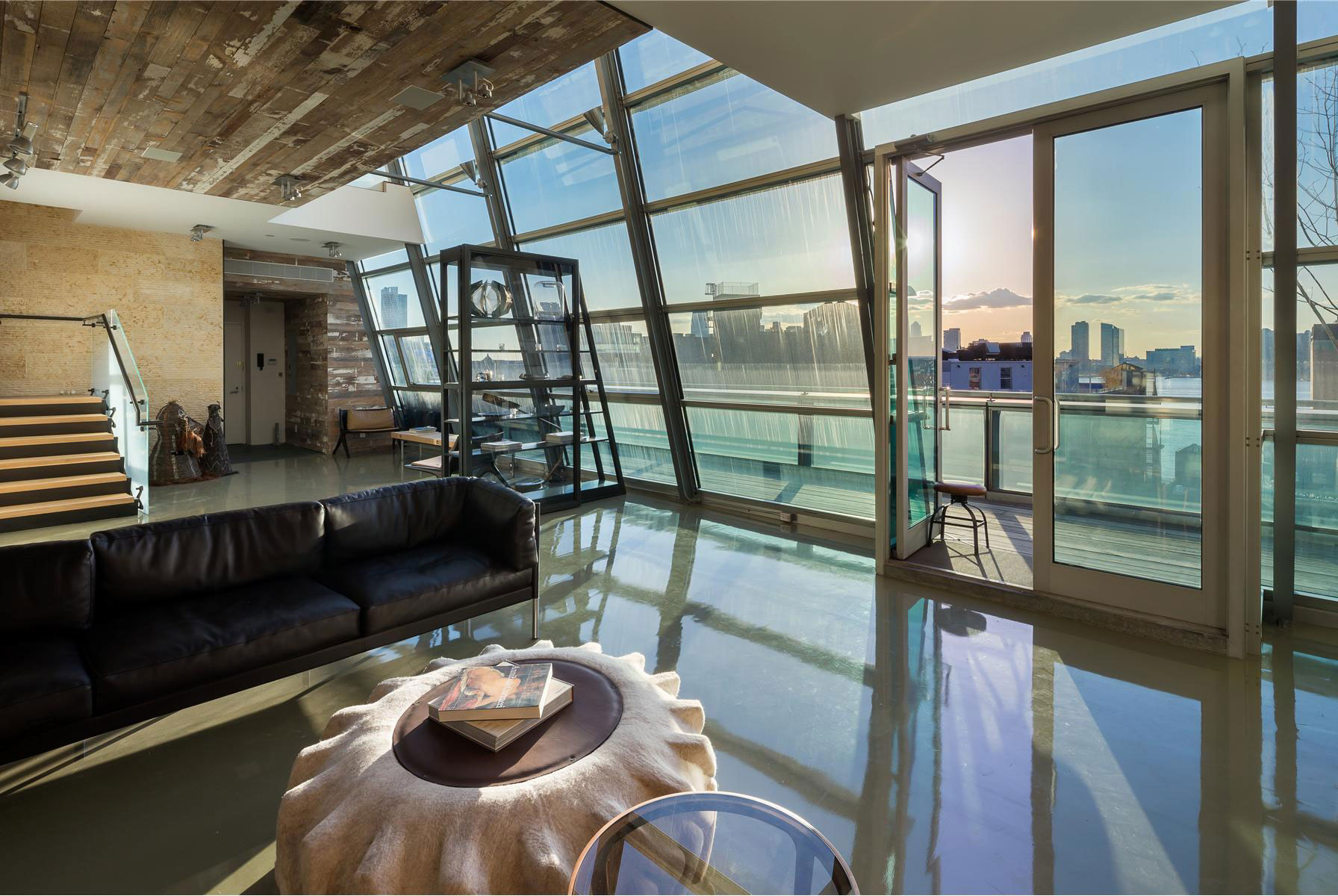 Leather Sofa Table Dark Leather Sofa Futuristic Coffee Table Wood Staircase With Metallic Frame Glass Door Greenwich Street Project Architecture Stunning Steel And Glass Structure Reflected In 497 Greenwich Street Penthouse