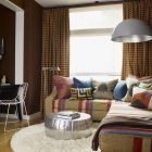 Living Room Striped Eclectic Living Room Idea Involving Striped Sofa Bed Manufactured In L Letter Shape With Colorful Pillows Decoration Impressive Sofa Beds As Elegant Furniture For Your Interior Accents