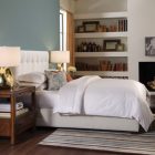 White Duvet Tufted Eclectic White Duvet Cover And Tufted Bed Headboard Wood Floor Striped Carpet Wood Bedside Tables Glossy Table Lamps Bedroom Natural White Duvet Cover For Simple Contemporary Bedrooms