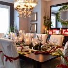 Christmas Dinner With Enchanting Christmas Dinner Table Decorations With Glamorous Chandelier White Side Chairs Small Square Mirror Shiny Candlesticks Dining Room Easy Christmas Dinner Table Decorations With Luxurious Colors Combinations