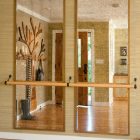 Tree Shaped Racks Enchanting Tree Shaped Used Coat Racks On Marble Floor Twin Rectangular Mirrors With Wood Railing In Spacious Entry Decoration Chic And Classy Coat Racks Brimming With Elegant Interior Decorations