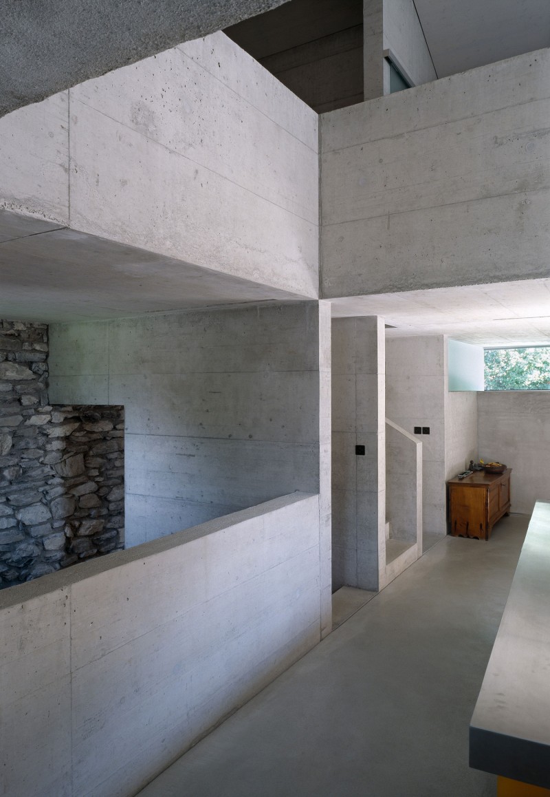 Chamoson House Stone Excellent Chamoson House With Natural Stone Wall Sleek Concrete Floor Small Concrete Staircase Wood Chest Stylish Kitchen Island Dream Homes Unusual Contemporary Rural House With Rough Stone Wall Structure