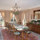 Christmas Dinner With Excellent Christmas Dinner Table Decorations With Tribal Pattern Carpet Old Wood Cabinet Glamorous Chandelier Wood Chairs Dining Room Easy Christmas Dinner Table Decorations With Luxurious Colors Combinations