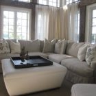 Catching White Center Eye Catching White Ottoman On Center With Tray As Coffee Table Surrounded By Light Grey Skirted Sectional Sofa Dream Homes Deluxe Sectional Sofa For Contemporary Furniture Of Minimalist Residence