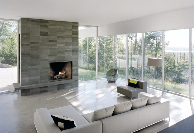 Modern Living Interior Fantastic Modern Living Room Design Interior With Stone Fireplace Design Used Small Grey Sofa Furniture And Glass Wall Decor Fireplace Classic Yet Contemporary Stone Fireplace For Wonderful Family Rooms