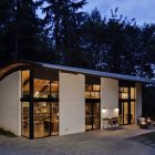 Night View Nautilus Fantastic Night View Of The Nautilus Studio With Concrete Terrace And Wide Glass Walls Under The Curve Roof Decoration Small And Beautiful Home Studio Designed For A Textile Artist