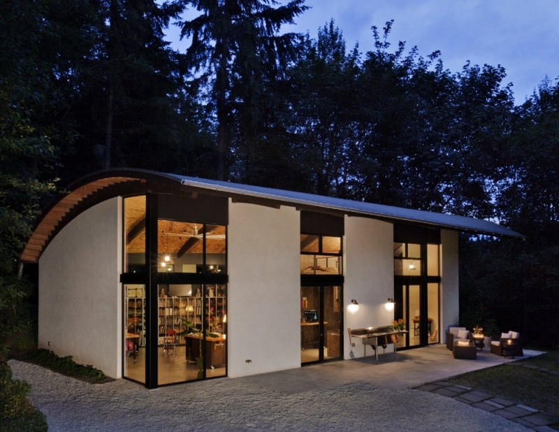 Night View Nautilus Fantastic Night View Of The Nautilus Studio With Concrete Terrace And Wide Glass Walls Under The Curve Roof Decoration  Small And Beautiful Home Studio Designed For A Textile Artist