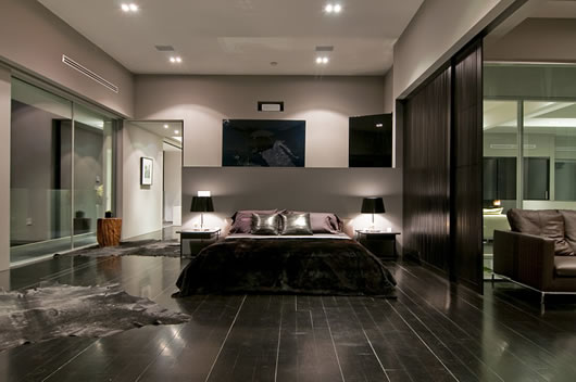A Black Spacious Fascinating A Black Bed In Spacious Room On The Black Floors In Luxury Home In LA Architecture  Luxurious And Modern Concrete Home With Long Swimming Pools