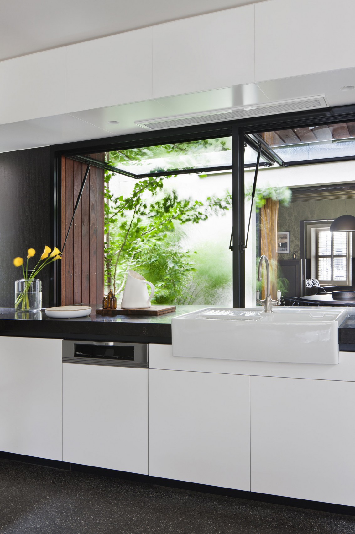 White Kitchen Dark Flashy White Kitchen Cabinet With Dark Marble Countertop Clean Yellow Lily In Glass Vase Nice Fitzroy House Porcelain Sink Dream Homes Bright Contemporary House With Open Plan Living Room Spaces
