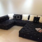 Dark Contemporary Tufted Glamorous Dark Contemporary Sofa With Tufted Surface Soft Fur White Cushions Nice Light Sleek White Laminate Flooring Decoration Elegant Contemporary Sofa With Comfortable And Casual Sitting Rooms