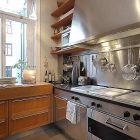 Kitchen Island Inside Glossy Kitchen Island And Extractor Inside Traditional Swedish Apartment Furnished Dining Ware And Open Cabinets On It Apartments Vintage Swedish Home Decorated With Contemporary Scandinavian Touch Of Traditional Style