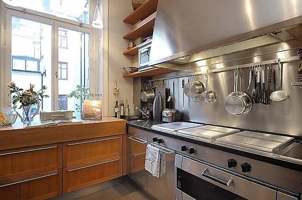 Kitchen Island Inside Glossy Kitchen Island And Extractor Inside Traditional Swedish Apartment Furnished Dining Ware And Open Cabinets On It Apartments Vintage Swedish Home Decorated With Contemporary Scandinavian Touch Of Traditional Style