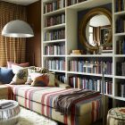 Cream Themed Furnished Gorgeous Cream Themed Home Library Furnished With Floor To Ceiling Bookcase And Striped Sofa Bed With Pillows Decoration Impressive Sofa Beds As Elegant Furniture For Your Interior Accents