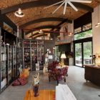 Interior Of Studio Gorgeous Interior Of The Nautilus Studio With Tidy Glass Cabinets And Red Sofas On Grey Concrete Floor Decoration Small And Beautiful Home Studio Designed For A Textile Artist