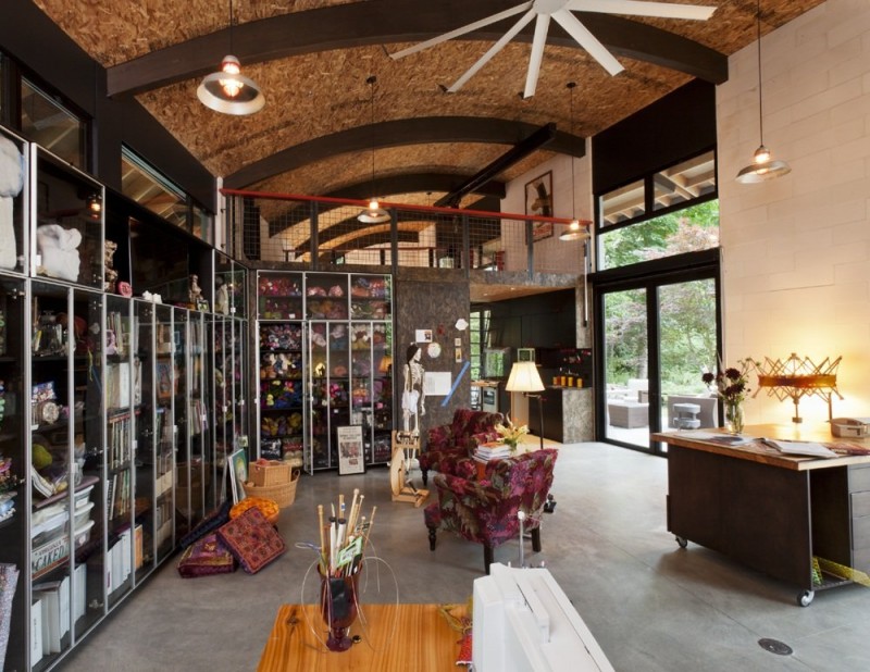 Interior Of Studio Gorgeous Interior Of The Nautilus Studio With Tidy Glass Cabinets And Red Sofas On Grey Concrete Floor Decoration Small And Beautiful Home Studio Designed For A Textile Artist