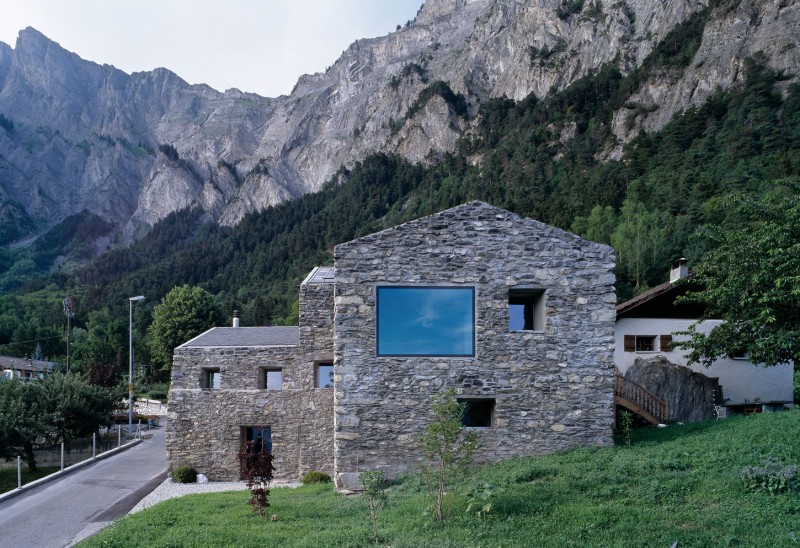 Chamoson House View Innovative Chamoson House With Mountainous View Rustic Stone Wall Square Glass Window Wood Staircase With Wood Railing Long Driveway Dream Homes Unusual Contemporary Rural House With Rough Stone Wall Structure