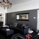 Small Living Interior Lavish Small Living Room Design Interior Used Black Leather Chesterfield Sofa Furniture And Crystal Traditional Chandelier Decoration Elegant Chesterfield Sofa With Beautiful Cushions On Its Sections