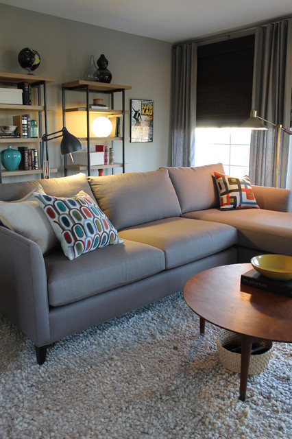 Century Home Enhanced Mid Century Home Family Room Enhanced With Small Sectional Sofas In Grey With Colorful Pillows As Decoration Decoration Small Sectional Sofas With Square Coffee Tables For Looking Stylish