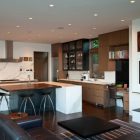 Kitchen In Hilltop Modern Kitchen In Washington Park Hilltop Residence With Wide Island And Black Stools Near Wooden Drawers Dream Homes Amazing Modern Home With Beautiful H-Shape Exterior Layout