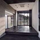 Concrete Textured Modern Rough Concrete Texture Wall In Modern Architectural House Folding Door Glass Window In Dark Frame Modern Ceiling Light Dream Homes An Old House Turned Into Sleek Contemporary Home In Montonate, Italy