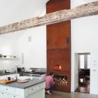 Fireplace Near Farmhouse Rustic Fireplace Near The Floating Farmhouse Kitchen With White Island And White Drawers On Concrete Floor Apartments Bewitching Modern Farmhouse With White Color And Rustic Appearance