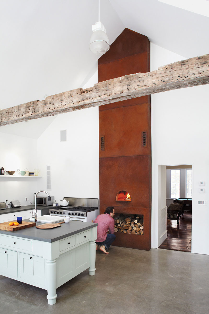 Fireplace Near Farmhouse Rustic Fireplace Near The Floating Farmhouse Kitchen With White Island And White Drawers On Concrete Floor Apartments Bewitching Modern Farmhouse With White Color And Rustic Appearance