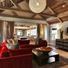 Living Room Red Rustic Living Room Idea Displaying Red Sectional Sofa Illuminated By Woven Globe Pendant Installed Above Table Decoration Gorgeous Red Sectional Sofas For A Stylish Modern Interiors