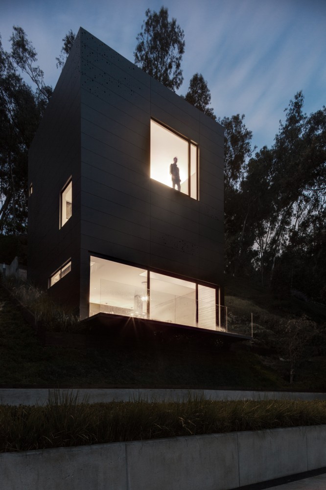 Evening View Shaped Sensational Evening View Of Cube Shaped Alta House Exterior With Glass Wall Ornamental Plants In Concrete Planter Dream Homes  Airy And Beautiful Mountain Retreat With Amazing Natural Landscape
